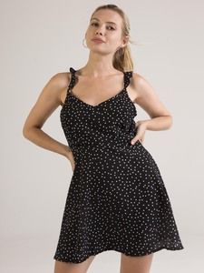 Robe à pois et dos ouvert